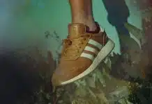 person wearing brown adidas shoe